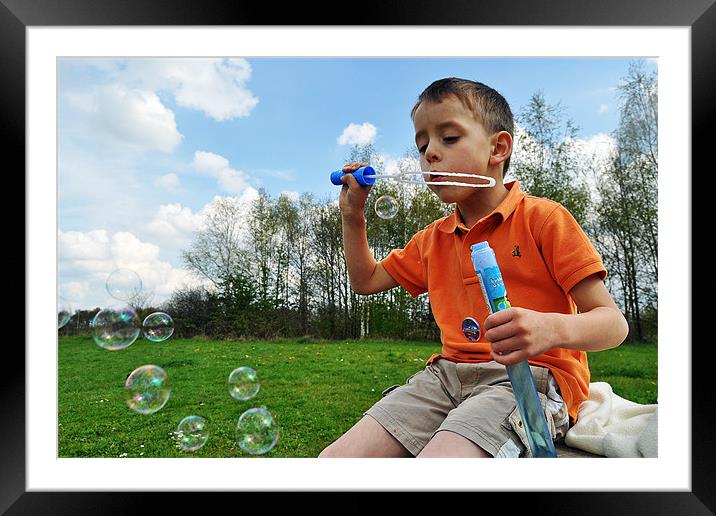 blowing bubbles Framed Mounted Print by michelle rook