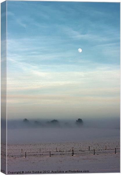 Snow Mist and Moon Canvas Print by John Dunbar