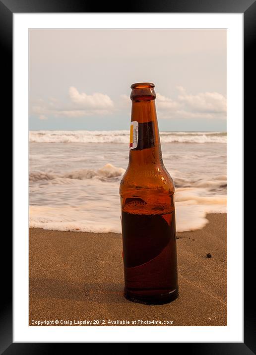 beer bottle on tropical beach Framed Mounted Print by Craig Lapsley
