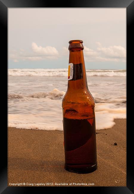 beer bottle on tropical beach Framed Print by Craig Lapsley