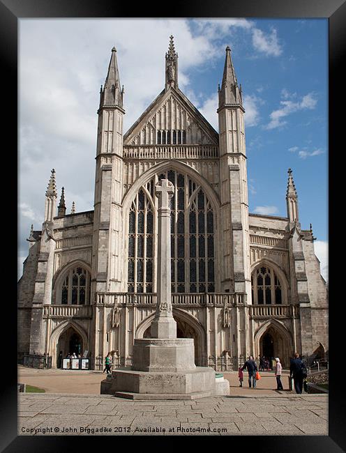 Winchester Cathedral and monument Framed Print by John Biggadike