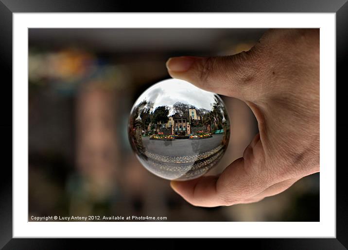 Port Merion in a crystal ball Framed Mounted Print by Lucy Antony
