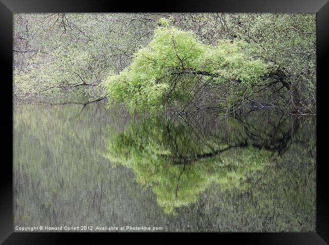 Lake reflection Framed Print by Howard Corlett