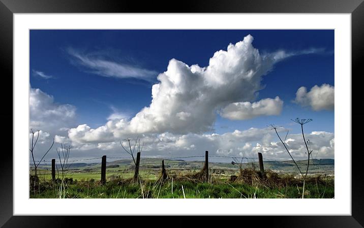 Clouds over the fence Framed Mounted Print by Kevin Dobie