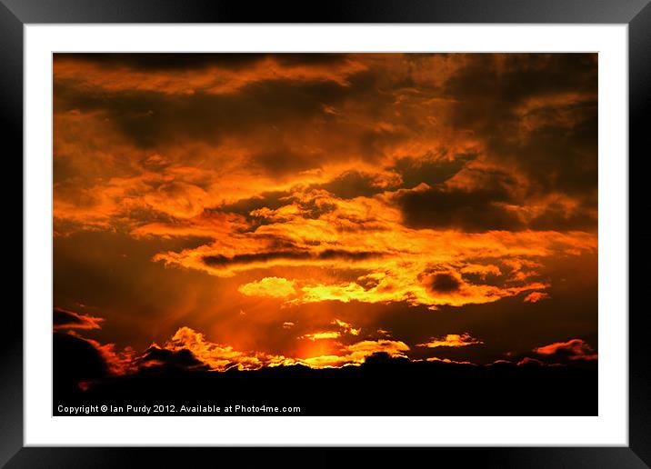 Rich orange sky Framed Mounted Print by Ian Purdy