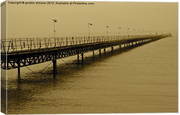 Historic Hythe Pier in Hampshire Canvas Print by Gordon Dimmer