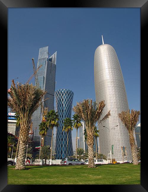 Doha skyscrapers. Framed Print by Maggie Jones