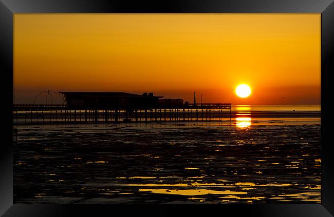 The Pier at sunset Framed Print by Phil  White