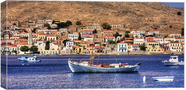 Halki Fishing Boat Canvas Print by Tom Gomez