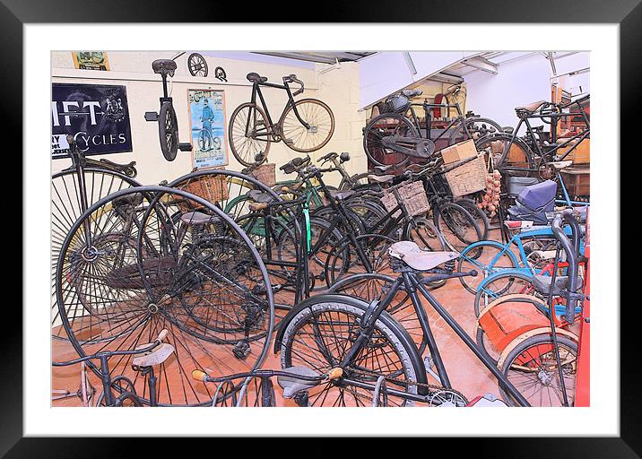 A Muddle of Old Bicycles Framed Mounted Print by Julie Ormiston