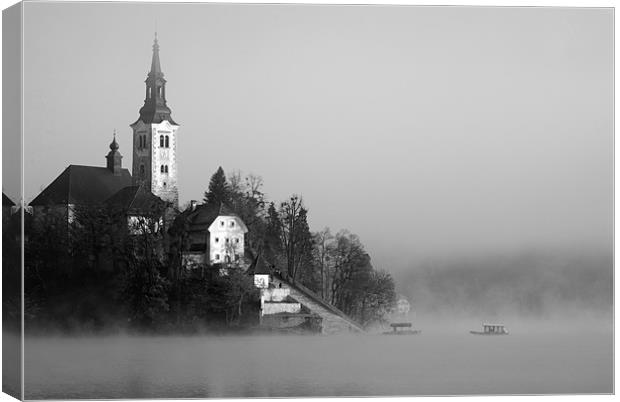Misty Lake Bled in Black and White Canvas Print by Ian Middleton