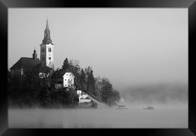 Misty Lake Bled in Black and White Framed Print by Ian Middleton