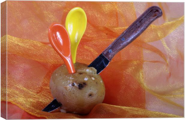 Potato with knife and teaspoons Canvas Print by Jose Manuel Espigares Garc