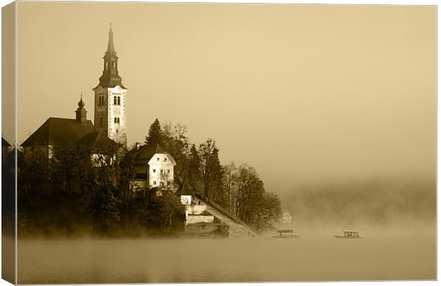 Misty Lake Bled in Sepia Canvas Print by Ian Middleton