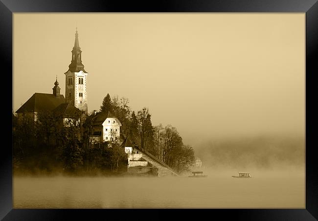 Misty Lake Bled in Sepia Framed Print by Ian Middleton