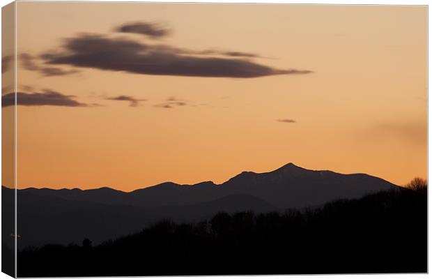 Mountain sunset Canvas Print by Ian Middleton