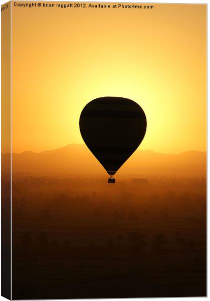 Balloon over the valley of the kings Canvas Print by Brian  Raggatt