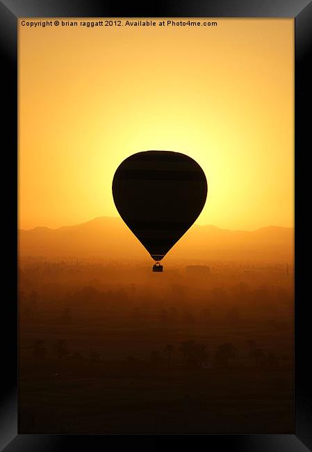 Balloon over the valley of the kings Framed Print by Brian  Raggatt