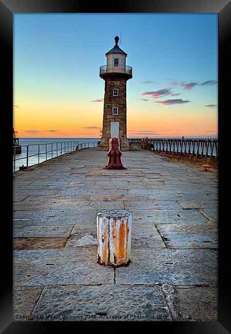Witby East Pier and Lighthouse Framed Print by Martin Williams