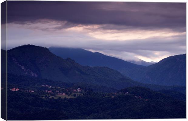 Alpine village at sunrise Canvas Print by Ian Middleton