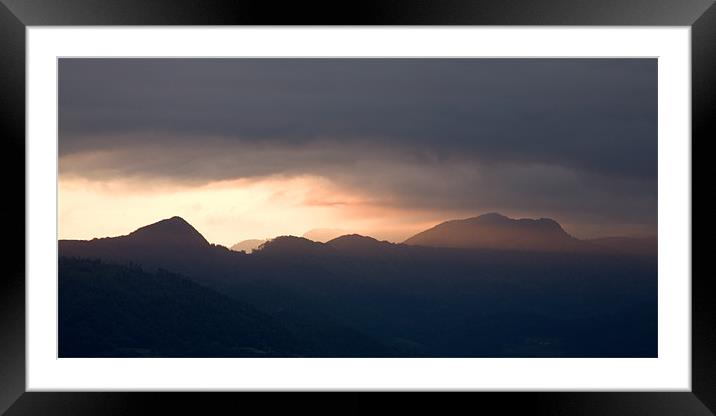 Mountain peak at sunrise Framed Mounted Print by Ian Middleton