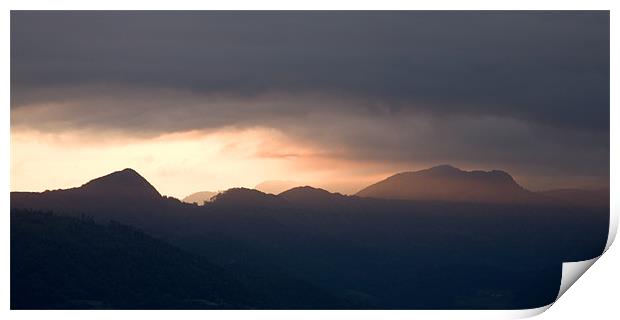 Mountain peak at sunrise Print by Ian Middleton