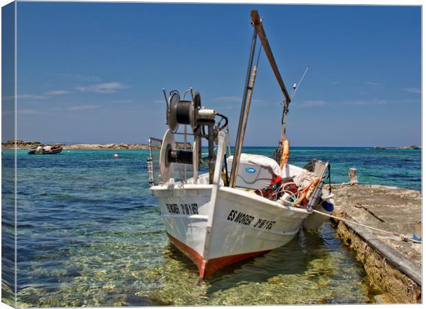FISHING BOAT (Ibiza) Canvas Print by raymond mcbride