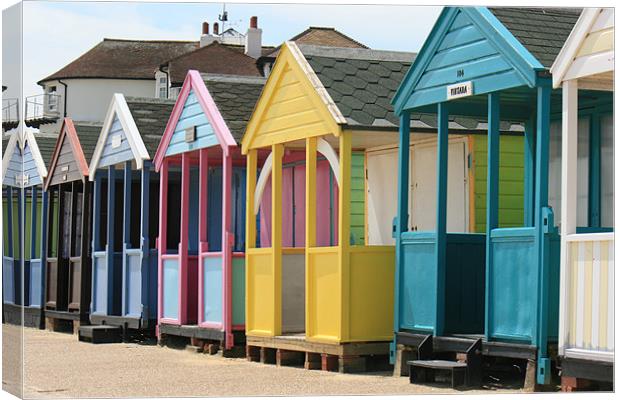 colourful Southwold beach huts Canvas Print by dennis brown