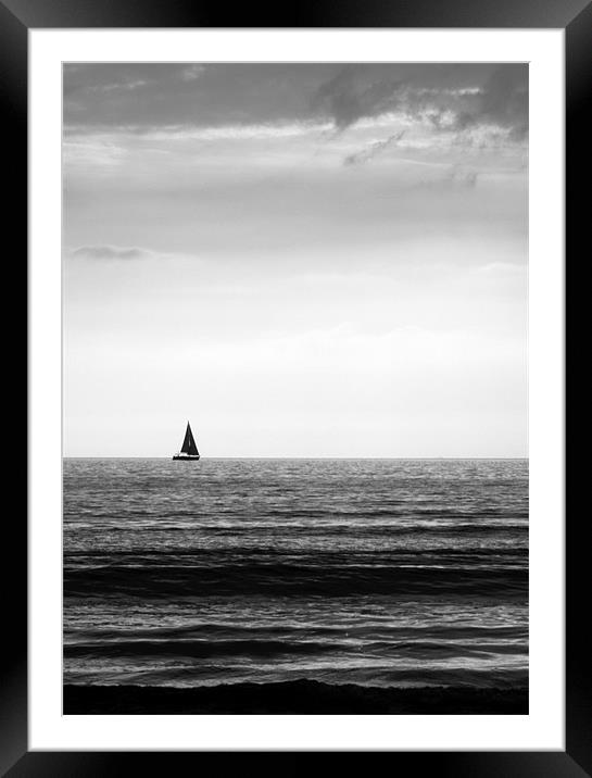 Lone Yacht Framed Mounted Print by John Biggadike