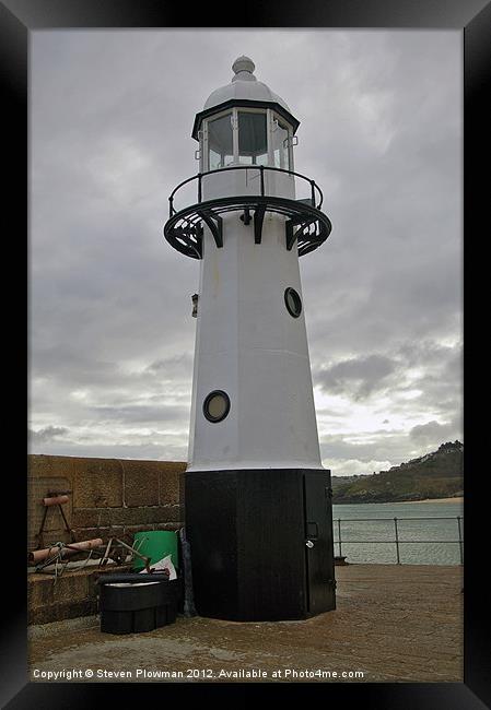 St Ives lighthouse Framed Print by Steven Plowman