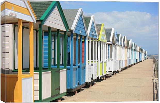 beach huts of Southwold Canvas Print by dennis brown