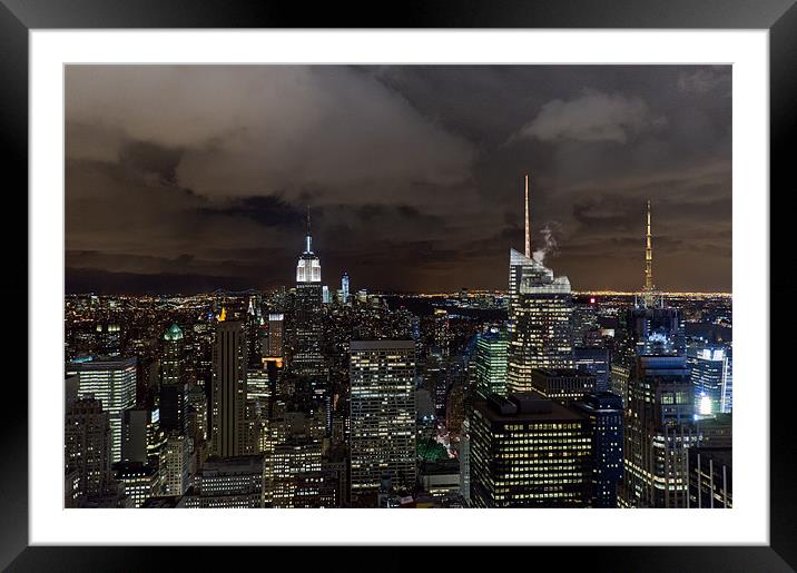 New York skyline at night Framed Mounted Print by Gary Eason