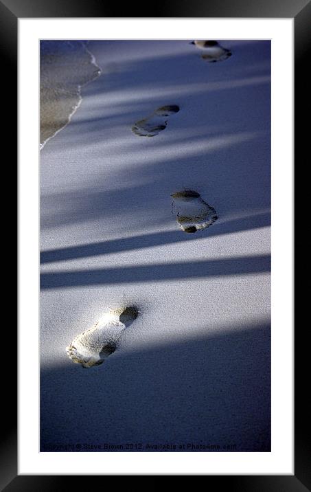 Foot prints in the sand Framed Mounted Print by Steve Brown
