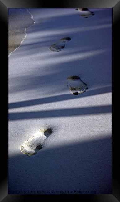 Foot prints in the sand Framed Print by Steve Brown
