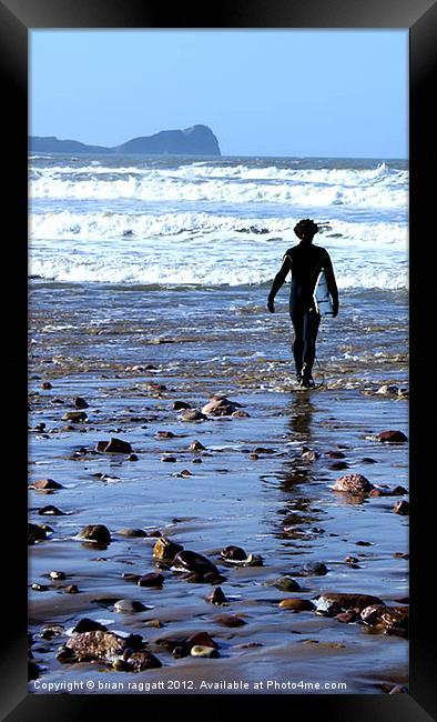 Solitary Surfer Framed Print by Brian  Raggatt