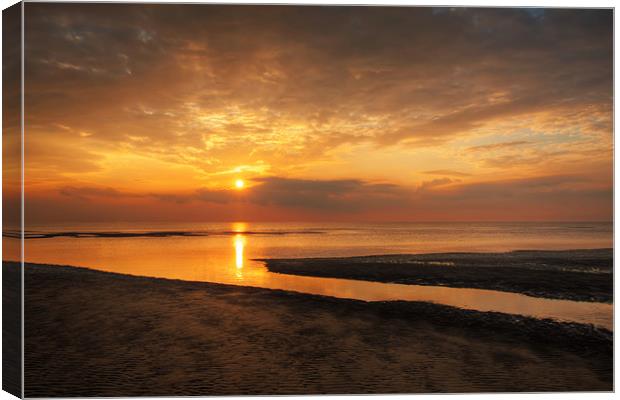The Setting Sun Canvas Print by Roger Green