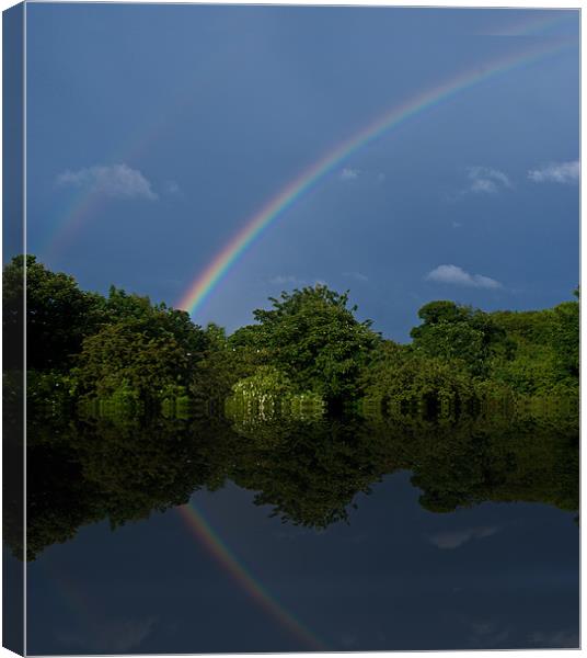 Rainbow Reflections Canvas Print by John Ellis