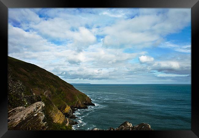Cliffs overlooking Polperro Cornwall Framed Print by Ian Jones