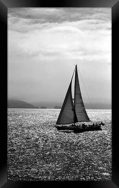 Yacht and the Isle of Wight Framed Print by Ian Jones