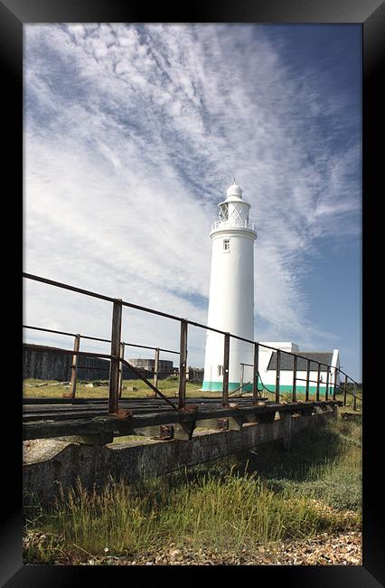 Hurst Spit Lighthouse Framed Print by Ian Jones
