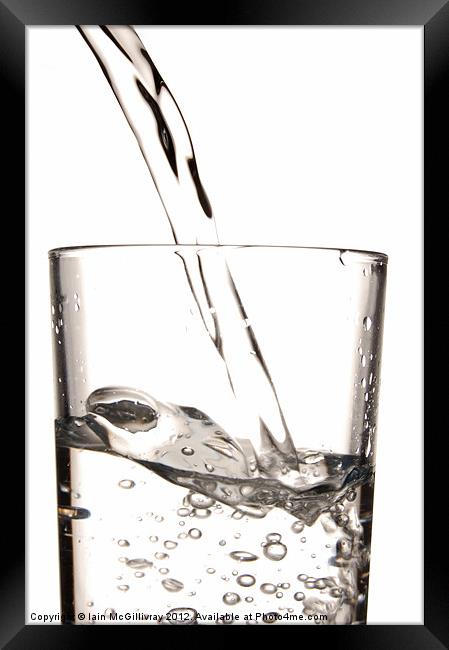 Pouring Glass of Water Framed Print by Iain McGillivray