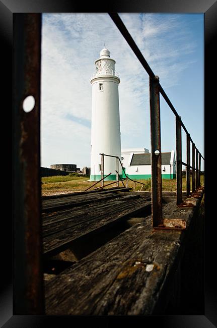 Lighthouse at Milford on Sea Framed Print by Ian Jones