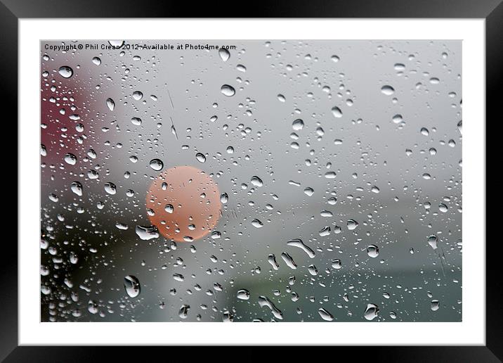 Raindrops and orange circle on window Framed Mounted Print by Phil Crean