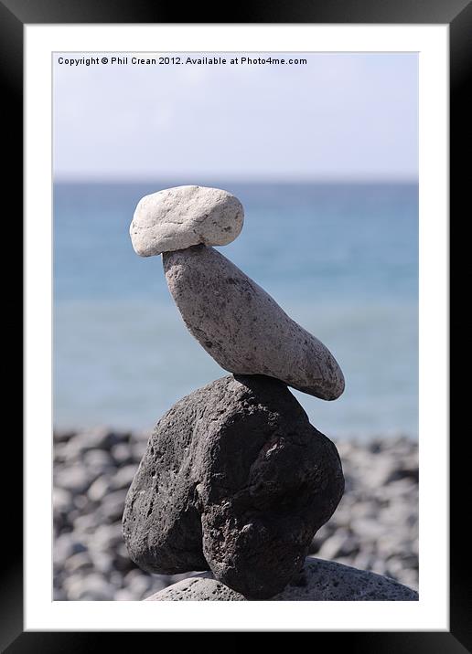Stone cairn, rocks perched on beach, Tenerife Framed Mounted Print by Phil Crean