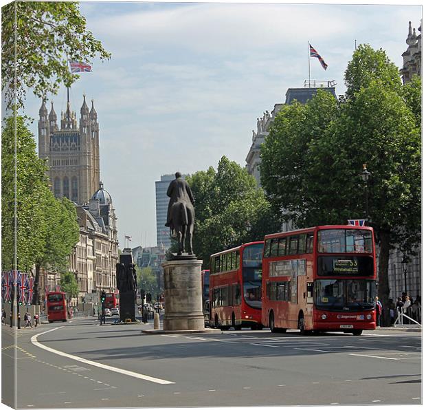 Red London bus in Whitehall Canvas Print by Tony Murtagh