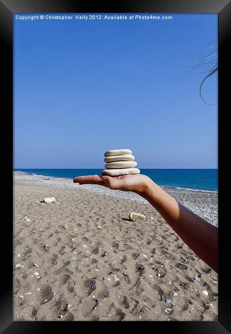 Balancing the stones Framed Print by Christopher Kelly