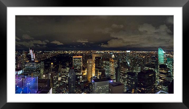 Uptown New York and Central Park at night Framed Mounted Print by Gary Eason