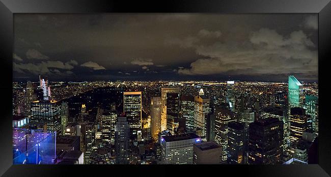 Uptown New York and Central Park at night Framed Print by Gary Eason
