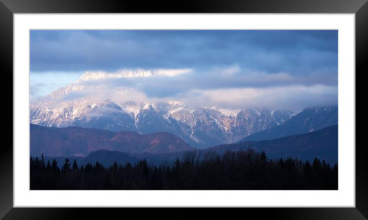 In the shadow of the mountain peak Framed Mounted Print by Ian Middleton