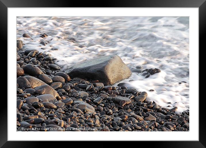 Pebbles & foam shoreline Framed Mounted Print by Phil Crean
